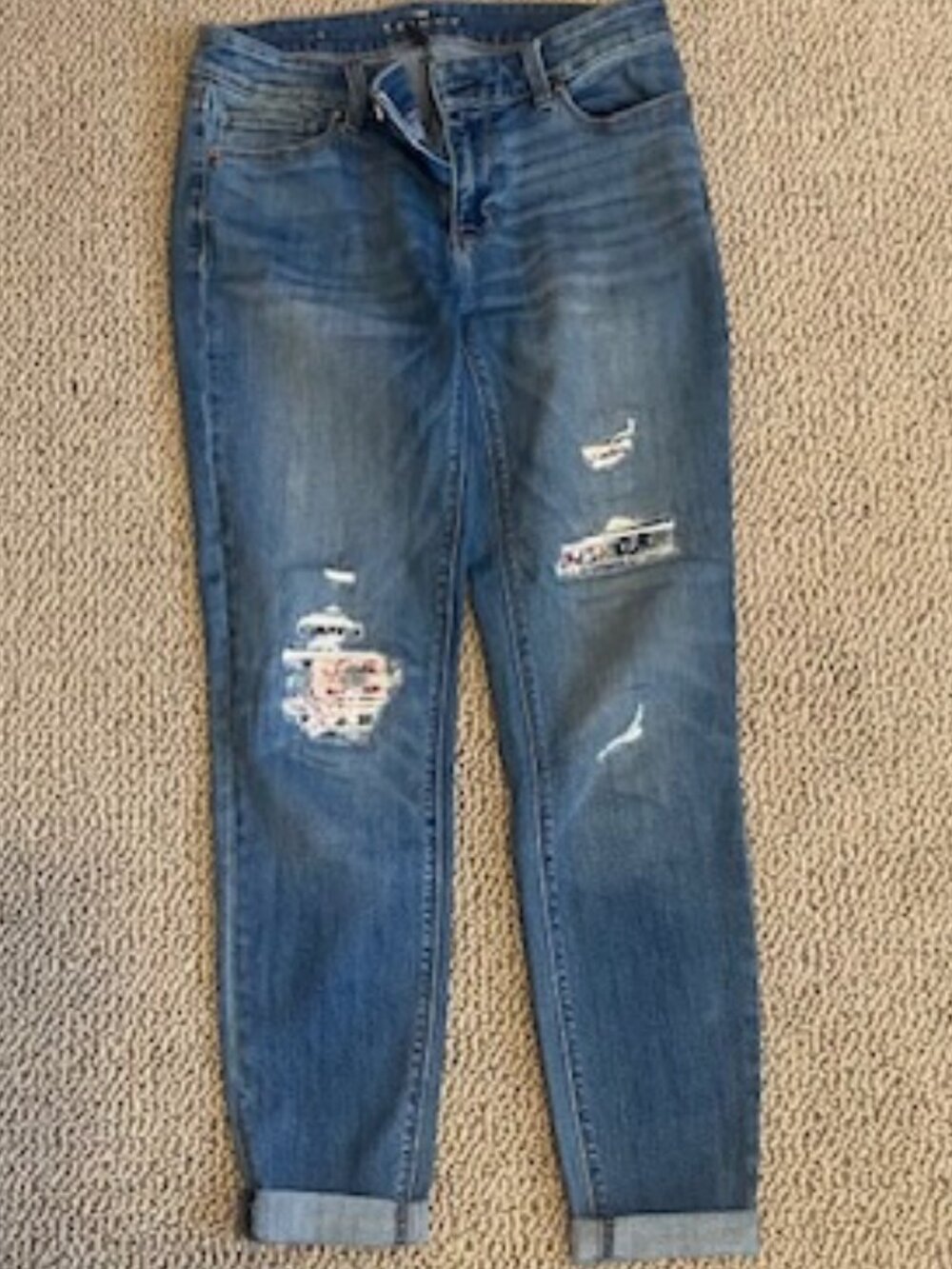 White House Black Market jeans, size 4, with cutout patchwork, skinny cut